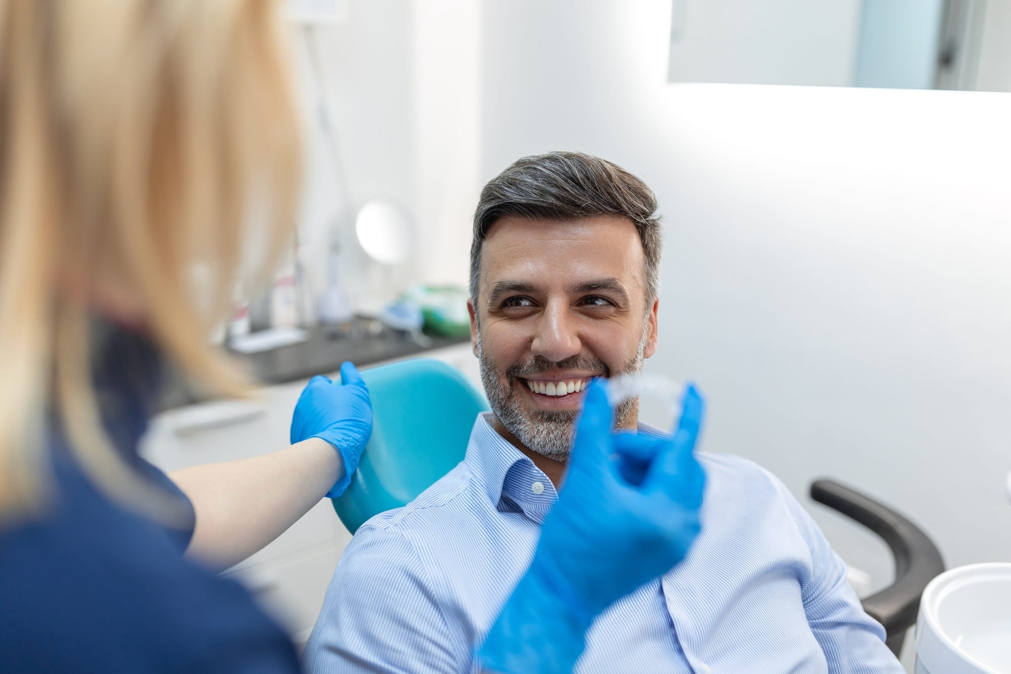 Confident Woman Smiling After Dental Restoration – Dental Implants